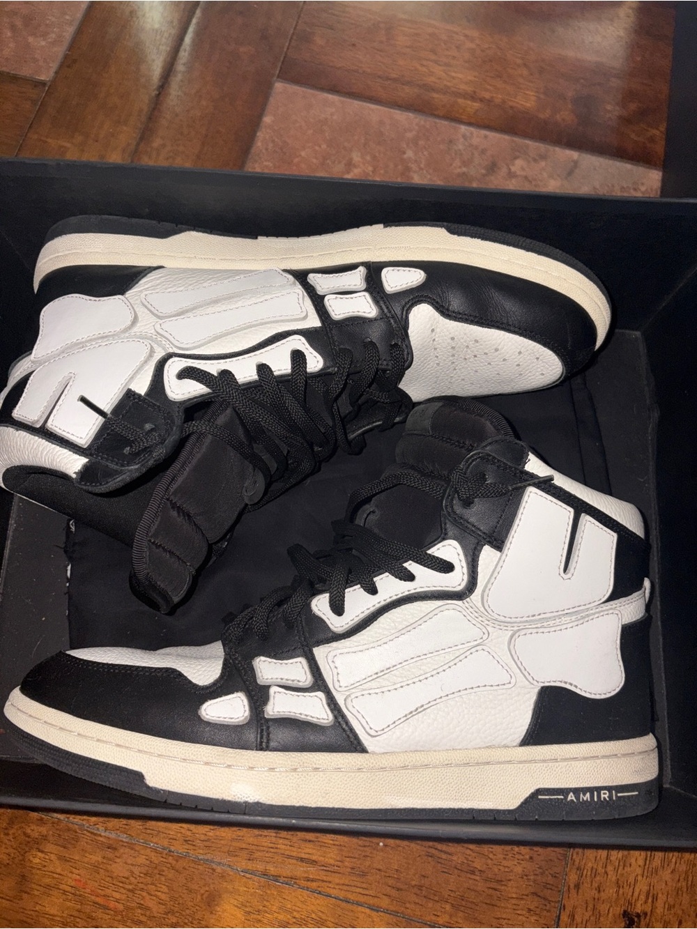 AMIRI Black and White “Skel” High-Top Sneakers